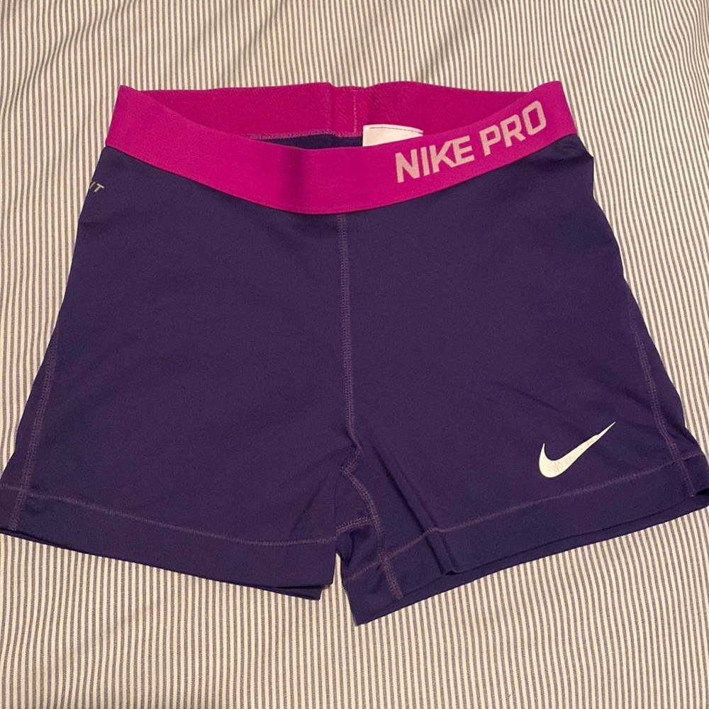 3” Purple Nike pro spandex with magenta waist band, size medium